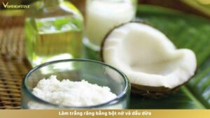 Làm trắng răng bằng bột nở và dầu dừa